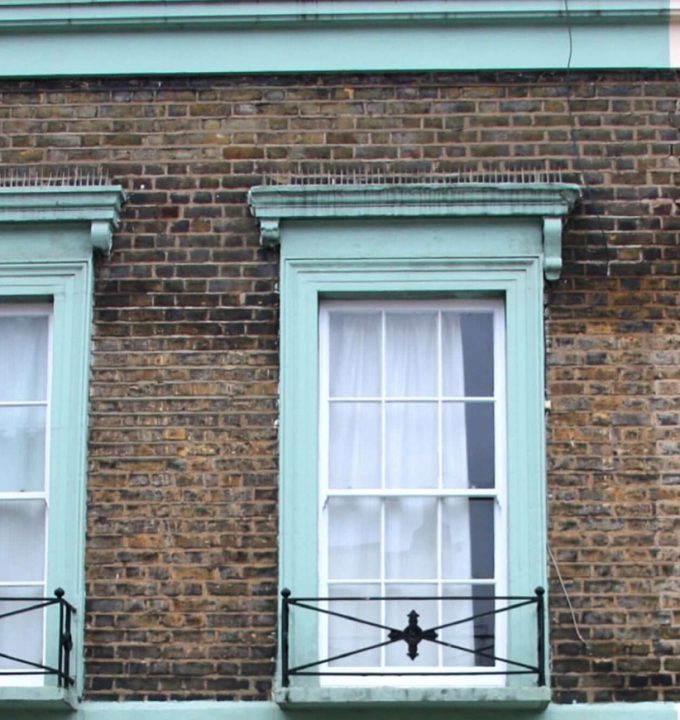 London terraced property with colourful window frames