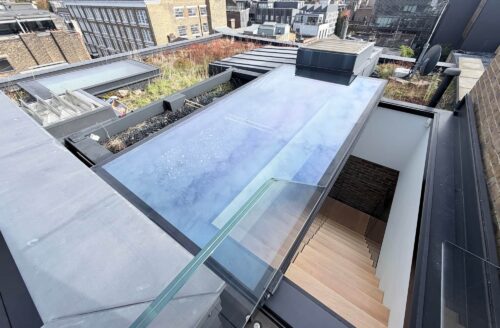 Roof extension with glazed rooflight on a London property during party wall works
