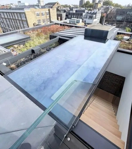 Roof extension with glazed rooflight on a London property during party wall works
