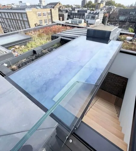 Roof extension with glazed rooflight on a London property during party wall works