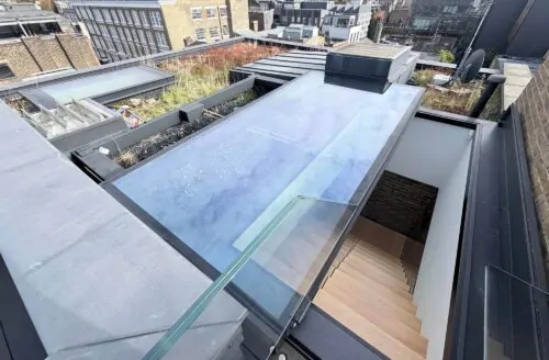 Roof extension with glazed rooflight on a London property during party wall works